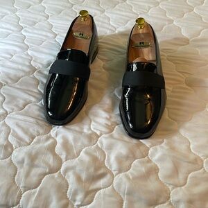 Black tuxedo shoes.